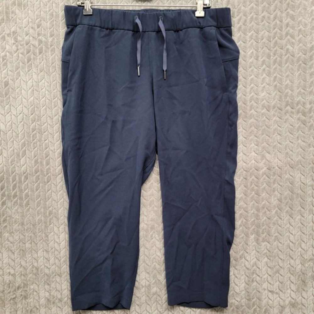 Lululemon On the Fly Crop Woven 23” Navy Blue Pants Drawstring Size 10 W6AVMS
